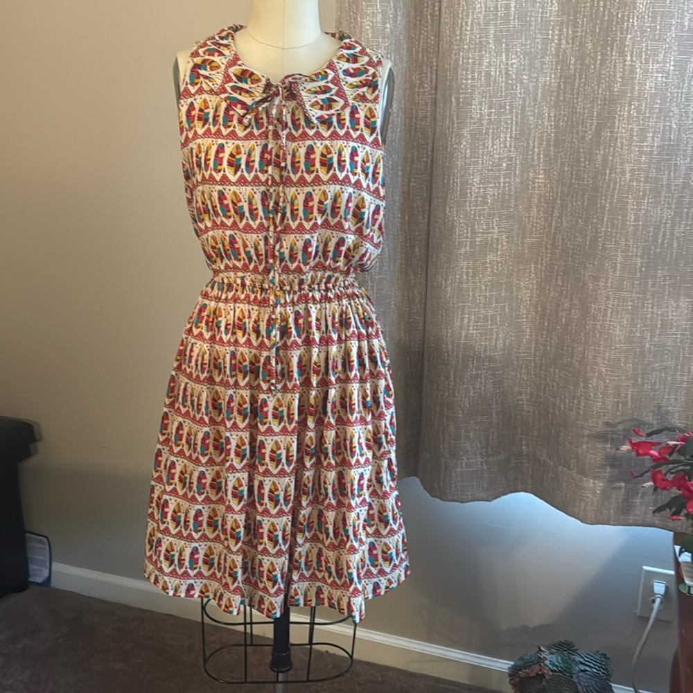 SM wardrobe,  size large , feather print dress